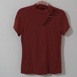 Mockneck shirt with strappy shoulder cutout